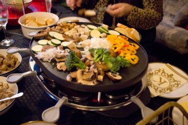 A beautiful variety of veggies/meals can be grilled together at the same time on the raclette top.