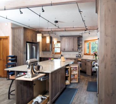 An island with it all — seating, storage, appliances and a durable work surface