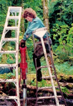 Dorothy Braid, Bob's wife, circa 1992. You know you're tough when you can operate a jackhammer while on a ladder placed in deep mud. (Photo courtesy Don McKinney)