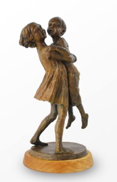 “Put Me Down!” 2014, bronze: A 2-year-old boy is caught in the arms of his sister’s loving embrace.