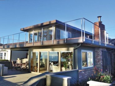 This beach home features a Rainier cable-railing system by AGS Stainless with stem reducers.