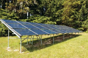 Solar panels installed in the backyard of Ron and Judy Bishop’s home