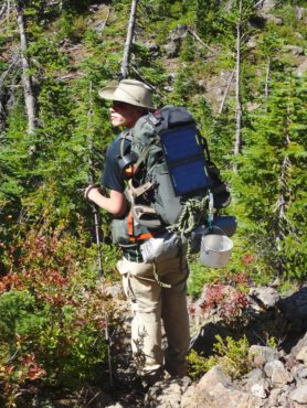 Robert Quill during a 40-mile backpacking trip last summer with his father; seen here on a trail on the north slope of the Mount Constance at an elevation of about 4,000 feet, after coming over the summit.