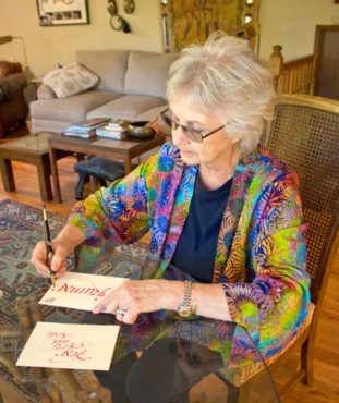 Dee Fergusson writes with her custom calligraphy pens.