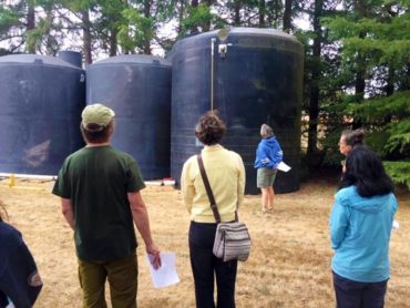 Stream steward trainees learn about the new cistern system installed at the Kitsap Conservation District in Poulsbo.