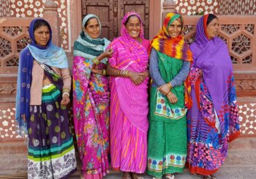 Indian women in front of the Taj Mahal