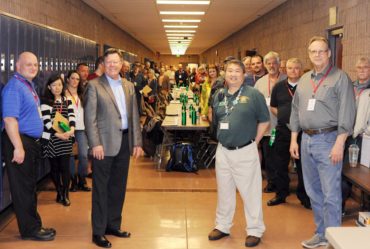 Kitsap County Commissioner Wolfe and WSSEF lead judge Dr. Mike Huey with a multitude of WSSEF volunteer judges.