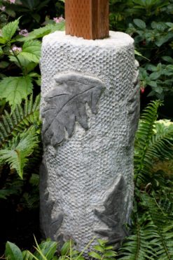The base of an arbor embellished with concrete