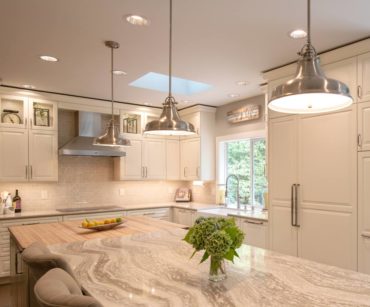 Built-in, panel-ready — refrigeration, freezer towers and chimney-style ventilation hood (Photo courtesy A Kitchen That Works, LLC)