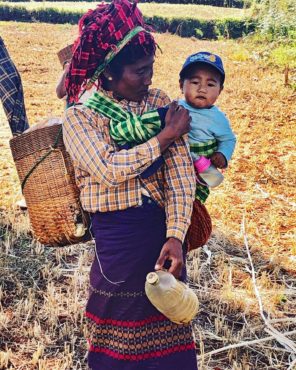 Mother and child working in the fields outside of Kalaw