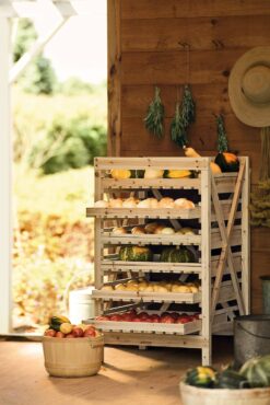Wooden orchard racks maximize storage space, while allowing air to reach each layer of produce. (Photo courtesy of Gardener's Supply Company)