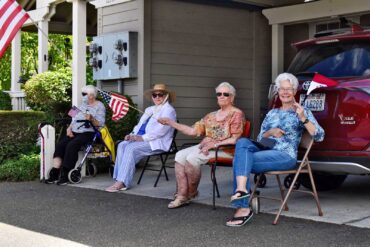 Local car clubs visit a retirement center.