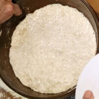 2) Turn soft dough out onto a floured board.