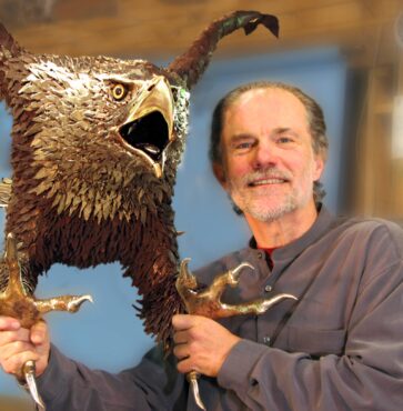 Gary Jackson with eagle. This photo appeared in the fall 2009 issue of WestSound Home & Garden magazine's "An Art-full Weekend" — a feature about the Gig Harbor Open Studio Tour. Due to COVID-19 restrictions, the event was canceled for 2020, which would've marked the 28th year of the tour. (Photo courtesy Charlee Glock-Jackson, 2007)