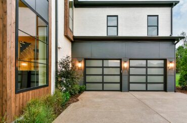 Eileen Black, a realtor with John L. Scott Real Estate Bainbridge Island, said this style of garage door is contemporary looking "but not in a way that makes the home too modern looking ... It just pulls it into the 21st century. It can really make a house stand out." (Photo courtesy Kitsap Garage Door)