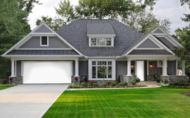 With the Door Imagination System app on Kitsap Garage Door’s website, you can upload a photo of your garage and see what various garage doors would look like on your home. (Photo courtesy Kitsap Garage Door)