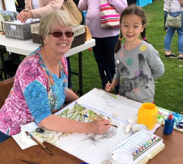 Kathy Thurston painting at the Gig Harbor Farmers Market