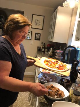 Building a pizza on a peel