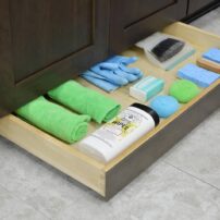 Make the most of every inch of storage with toe-kick drawer storage. (Photo courtesy Dura Supreme Cabinetry)
