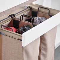 Pull-out laundry bags with handles by TAG Hardware (Photo courtesy Hafele)