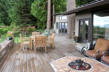 Timbertech composite decking. Design by A Kitchen That Works LLC. Stainless hand rail by AGS Stainless