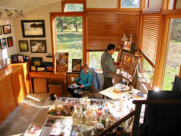 Robin and Ann Weiss, Knowles Studio, are demonstrating their work during a previous year's Art in The Woods.