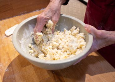 Add butter mixture to egg and milk and mix gently.