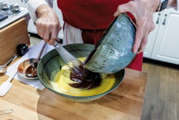 Add melted chocolate mixture to eggs.