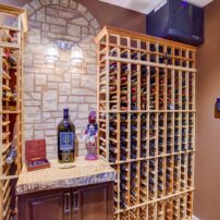 Wine room temperature and humidity controled by WhisperKool wine cellar cooling system — design by A Kitchen That Works LLC (Photo courtesy Iklil Gregg)
