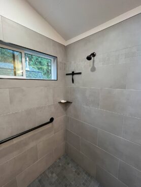 Small bathroom now accommodates a shower.