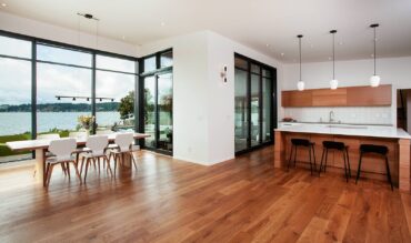 To provide more space, this kitchen was relocated from the center of the first floor to the far end, formerly the door. (Photo courtesy Northlight Photography)