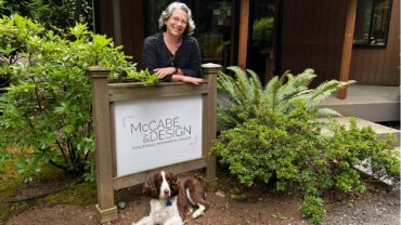 McCabe at her office in the wood with Miss Mara, her english springer spaniel (Photo courtesy Gigi Michaels)