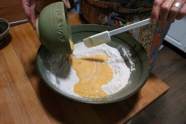 Mix blended wet ingredients into dry ingredients.