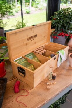 This bamboo seed saver kit contains storage envelopes, glass vials and compartments to organize seeds and hold them in place. (Photo courtesy of Gardener's Supply Company/gardeners.com)