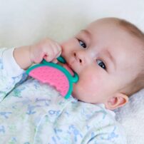baby chewing plastic
