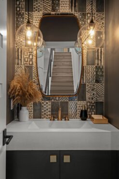 Design Trends 2024 Pattern play with full-height tile backsplash, bold statement pendant lights and chunky concrete countertop
