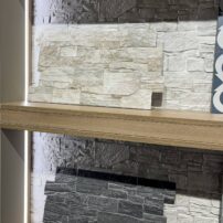 The realistic look of dry stacked stone in a lightweight format installation for interior fireplaces or accent walls as well as exterior garden walls