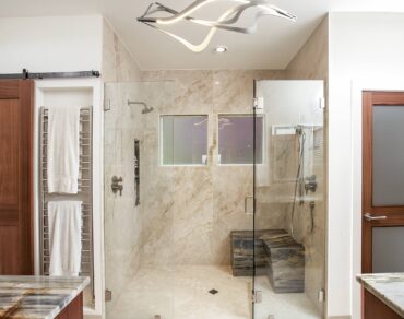 Spacious shower for two replaces undesired tub.