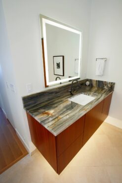 Multi-Kelvin LED mirror and under-vanity indirect LED lighting — design by McCabe By Design (Photo courtesy Keith Brofsky)