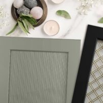 Textural cabinet face in an earthy green finish, natural materials (rocks and wood) speak to the continuing biophlic design trend.