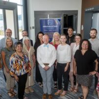 New and returning members of the Greater Kitsap Chamber board were sworn in at the June luncheon. Front (l-r): Mike Columbus, Haselwood Auto Group; Stacy Luckensmeyer, EOS; April Onofre, Kitsap Bank; Susan Larsen, Land Title Company; Shauna Washburn, United Moving & Storage; John Morrissey, Kitsap RV; Ashley Oaksmith, Kitsap Regional Library; Karen Bevers, Bremerton School District; Irene Moyer, GKC. Back (l-r): David Emmons, GKC; Chad Melton, VMFH — St. Michael Medical Center; Breane Martinez, Nothing Bundt Cakes; Jennifer Strong, Kitsap Credit Union; Togasii Peko, Luxe Real Estate & Clark Construction; Alysa Grimes, Bagwell Law; Jason Ritter-Lopatowski, Rice Fergus Miller Architecture; and Rick Soper, LPL Financial at Kitsap Credit Union.