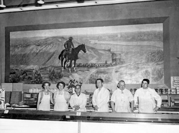 Left to right: Betty, sister; Elma, sister; Harry, brother; George, founder; Harold Minder, brother; Jim Minder, brotherPhoto taken at Minder Meats/Silverdale Co-Op, 1959