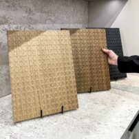 A beautiful textural rattan cabinet door style with a closed back from Hacker Kitchens