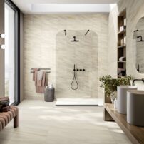 Two sizes of rectified edge porcelain tile in Bianco Lasa finish from the Eden Collection by Del Conca USA