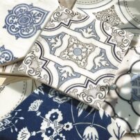 Painted natural stone tiles from the Artisan and Custom Stone Collections by California- based Stone Impressions