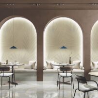 Large-format, porcelain panels with a re-human trending biofilic pattern. From the Gemini Collection in the Flora Luce finish by Crossville Tile