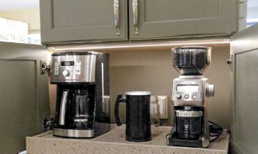 Solid-surface roll-out counter for coffee center. Design by McCabe By Design LLC