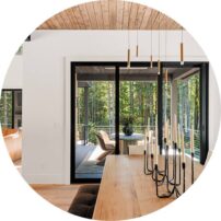 STATEMENT PIECES Much of the lighting is from Seattle Lighting and Visual Comfort & Co.