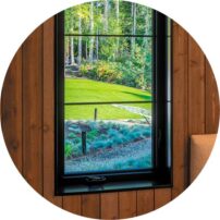 TEXTURE AND INTEREST The headboard wall is by Montana Timber Products and is Ranchwood in Yellowstone.