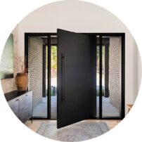 OPEN SESAME This stately door is from the Pivot Door Company, and was one of the items on the homeowners’ design wish list.